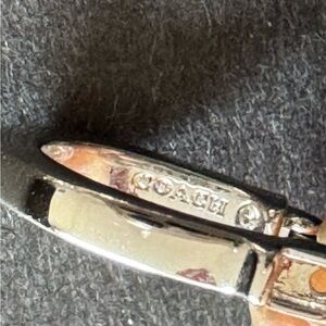 Coach silver and crystal horseshoe shaped earrings